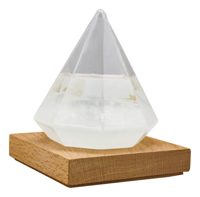 Búrkové sklo v tvare diamantu na drevenom podstavci – výška 13 cm